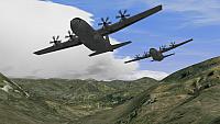 CAE Medallion RAF C-130Js flying thru valley in Scotland 2